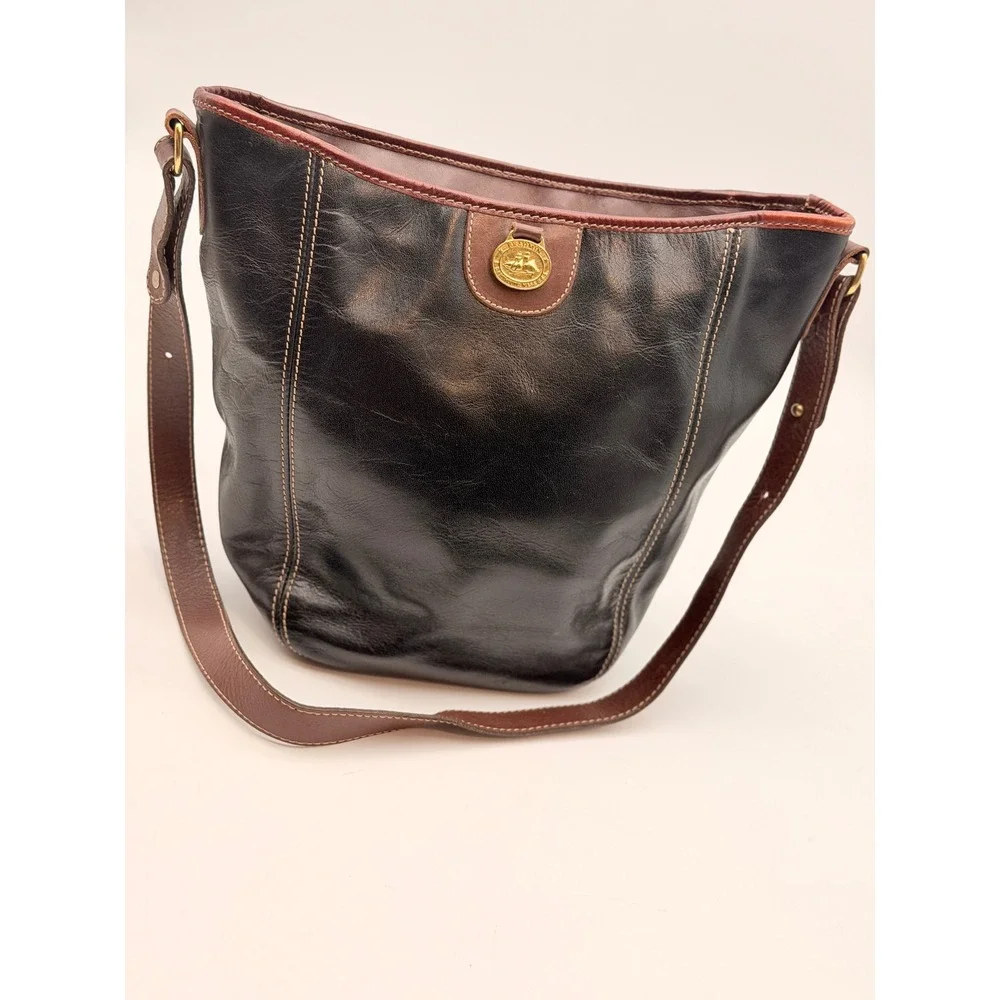 Brahmin Vintage Black Leather Bucket Bag Brown Trim Gold Medallion Made in USA